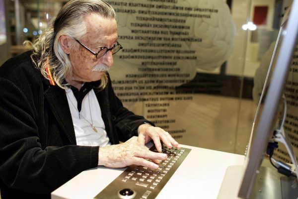 (dpa) - Expert Joseph Weizenbaum sits at a computer desktop in the computer museum in Paderborn, Germany, 3 May 2005. According to well-known US computer expert and philosopher Weizenbaum the Internet is a 'scrap heap' that misleads people into overestimation of one's own capabilities. Weizenbaum, inventor of the language analysis software ELIZA, held a speech at the world's biggest computer museum in Paderborn. Photo by: Computermuseum Paderborn/picture-alliance/dpa/AP Images