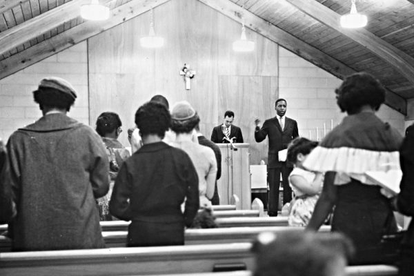 Gerald_Hughes_Cleveland_School_Teacher_Leads_the_Lee_Heights_Community_Church_Cleveland_Ohio_Congregation_in_Song_1960_16458543170