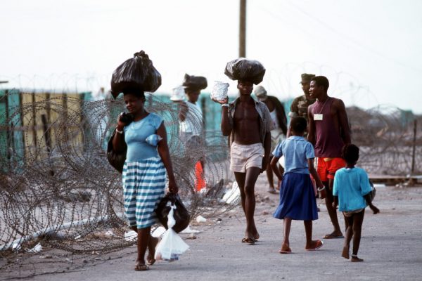 haitian-refugees-go-about-their-daily-routine-at-the-camp-mccalla-tent-facilities-458f37-1600-1