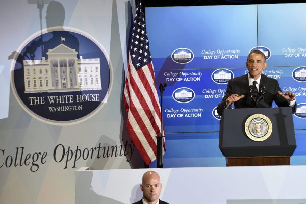 President Barack Obama speaks at the Summit on College Opportunity at the Ronald Reagan Building in Washington, Thursday, Dec. 4, 2014. This years summit will focus on building sustainable collaborations in communities with strong K-12 and higher education partnerships to encourage college attendance. (AP Photo/Susan Walsh)