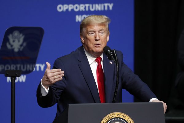 President Donald Trump speaks during the North Carolina Opportunity Now Summit in Charlotte, N.C., Friday, Feb. 7, 2020. (AP Photo/Gerry Broome)